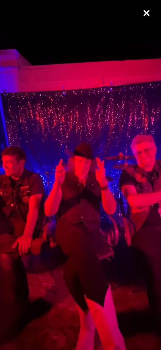 Live performance still from a bonus video